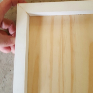 Shelf within frame